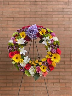 Mixed Round Wreath  - A 21inch round wreath with mixed flowers (color of choice)