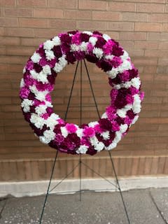All Carnations Standing  Round Wreath  - A 21 inch round wreath filled with carnations (colors of choice)
