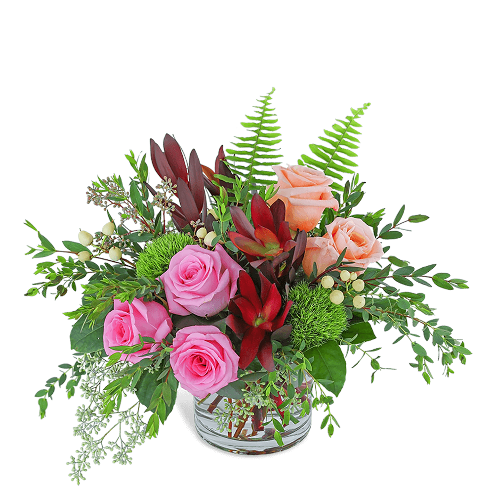 Natural Garden - Natural Garden is long-lasting and overflowing with natural beauty! It is a full and lush design that features Leucadendron, soft peach and pink roses, hypericum berry, and premium foliage. A gift of hand-arranged flowers will be sure to impress or add a beautiful elegance to the recipient's home or office space.