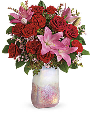 Pretty In Quartz Bouquet Pretty In Quartz Bouquet - Inspired by the rose quartz gemstone that symbolizes love, this shimmering, hand-blown art glass vase is the perfect backdrop for this romantic pink and red bouquet.