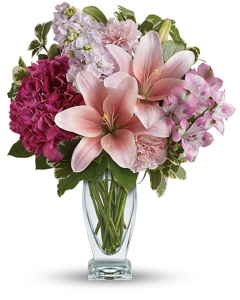 Teleflora's Blush Of Love Bouquet - Celebrate your love with this beautifully blushing bouquet! Luxurious lilies, delicate hydrangea and fragrant stock delight her senses, soothe her soul, and tickle her fancy. It's a loving gift she won't soon forget! Includes pink hydrangea, asiatic lilies, alstroemeria, carnations and stock, accented with fresh greens. Delivered in a Couture vase.