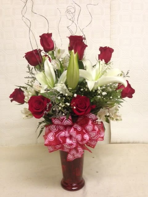 Unconditional Love - Beautiful  Long stem red roses, White Siberian Lilies and alstroemeria in an upscale vase. 