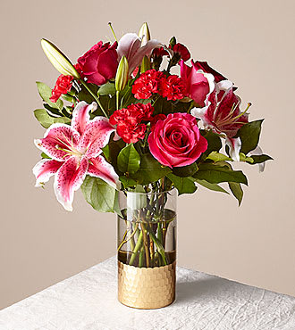 Be Mine Bouquet - Remind your special someone that you'll always be theirs with the beautiful Be Mine bouquet. Featuring gorgeous red &amp; pink roses, carnations, lilies &amp; snapdragons, this bouquet is sure to light up the room when it arrives.