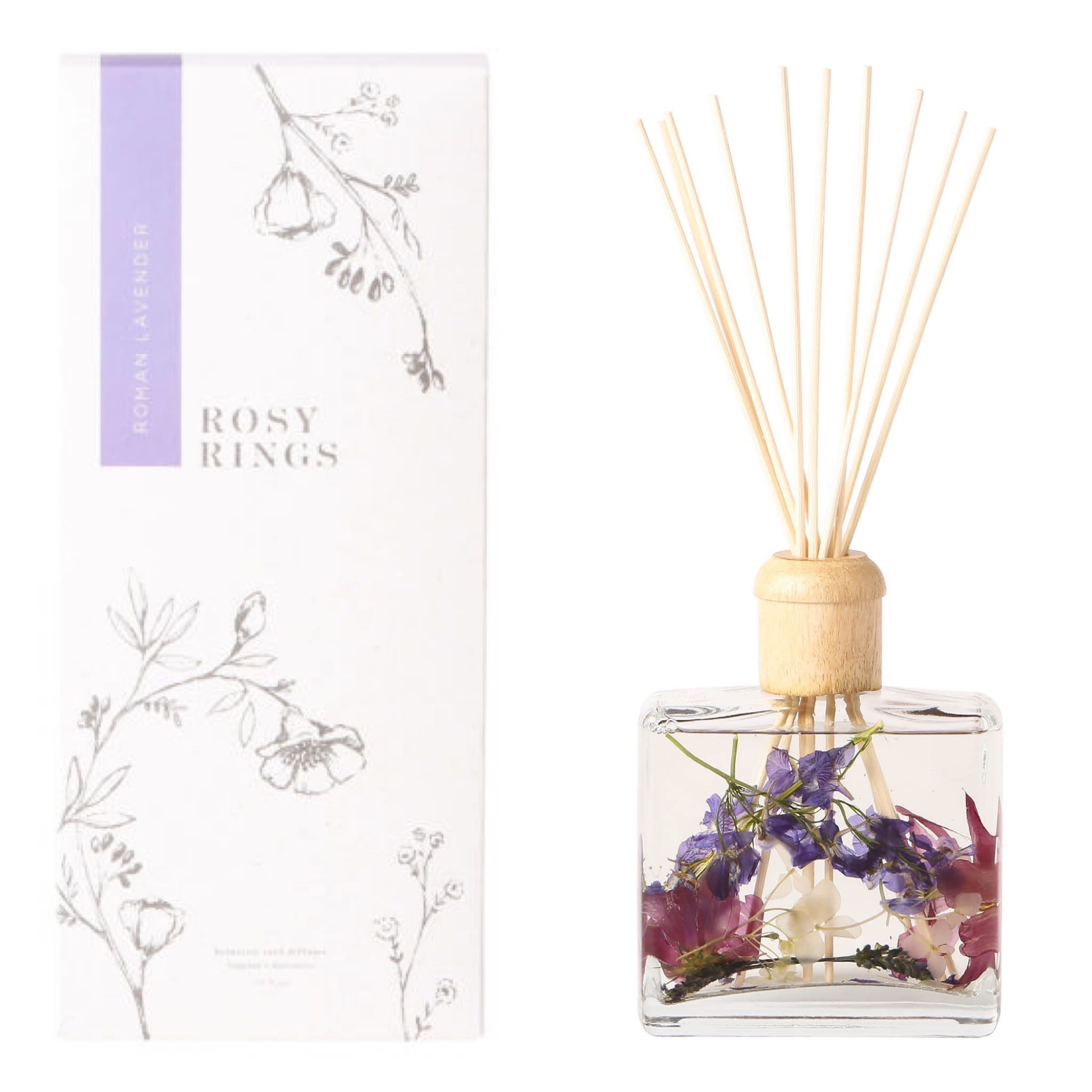 Rosy Rings Roman Lavender Botanical Reed Diffuser - Crisp bergamot and eucalyptus open the door to an elegant blend of true lavender with vanilla. 13 oz./Lasts 6-12 months avg. Gorgeous packaging is the perfect complement to dramatic square bottles filled with real spices, fruit and botanicals. Every natural element you see inside the glass vessel is delicately placed there by hand. Lovingly packaged with a wooden cap + 10 reed sticks.