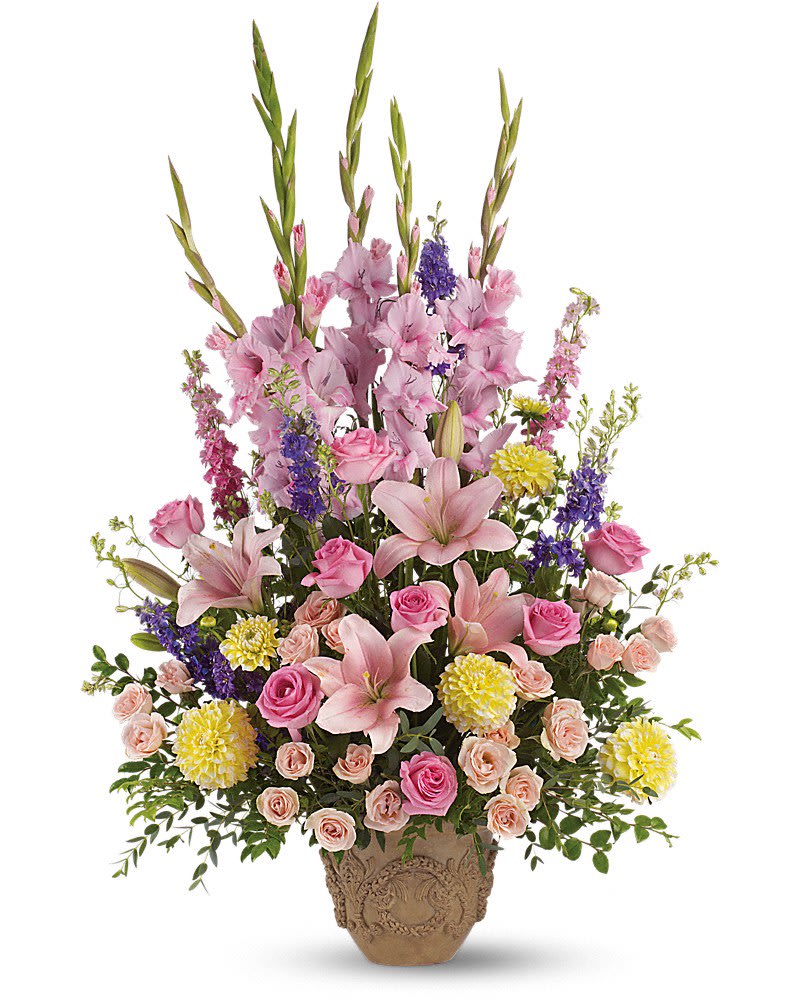Ever Upward Bouquet by Teleflora - Not at all somber are these abundant blooms of pink, yellow and lavender, gracefully arranged in a container that is equally suitable for a memorial service or one's home. Fresh flowers such as pink roses, lilies, gladioli and larkspur stems artfully mixed with yellow dahlias and purple larkspur.
