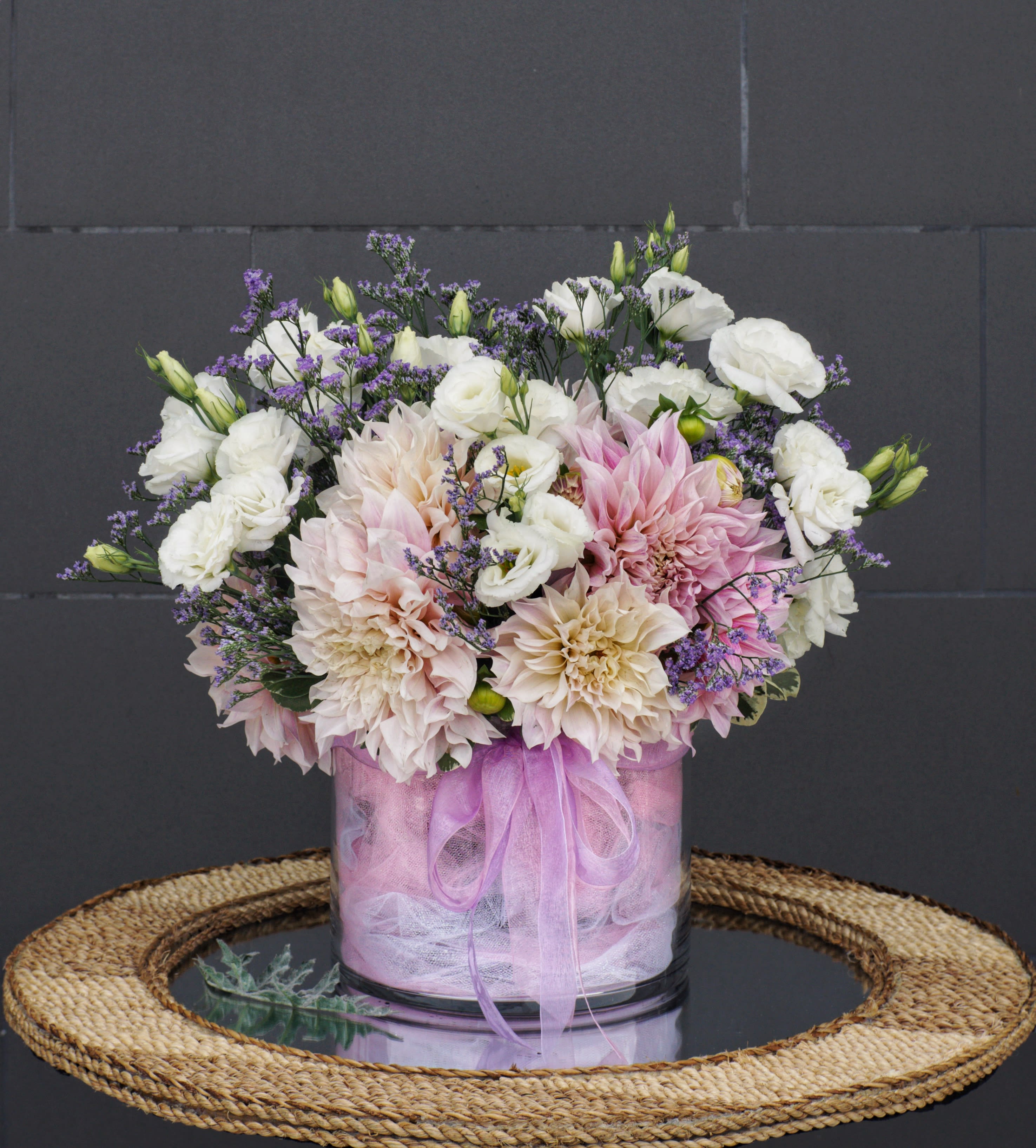 Hello Gorgeous - Sweet like a young lady, this design includes lovely dahlia (SEASONAL), soft lisianthus and nice accents.