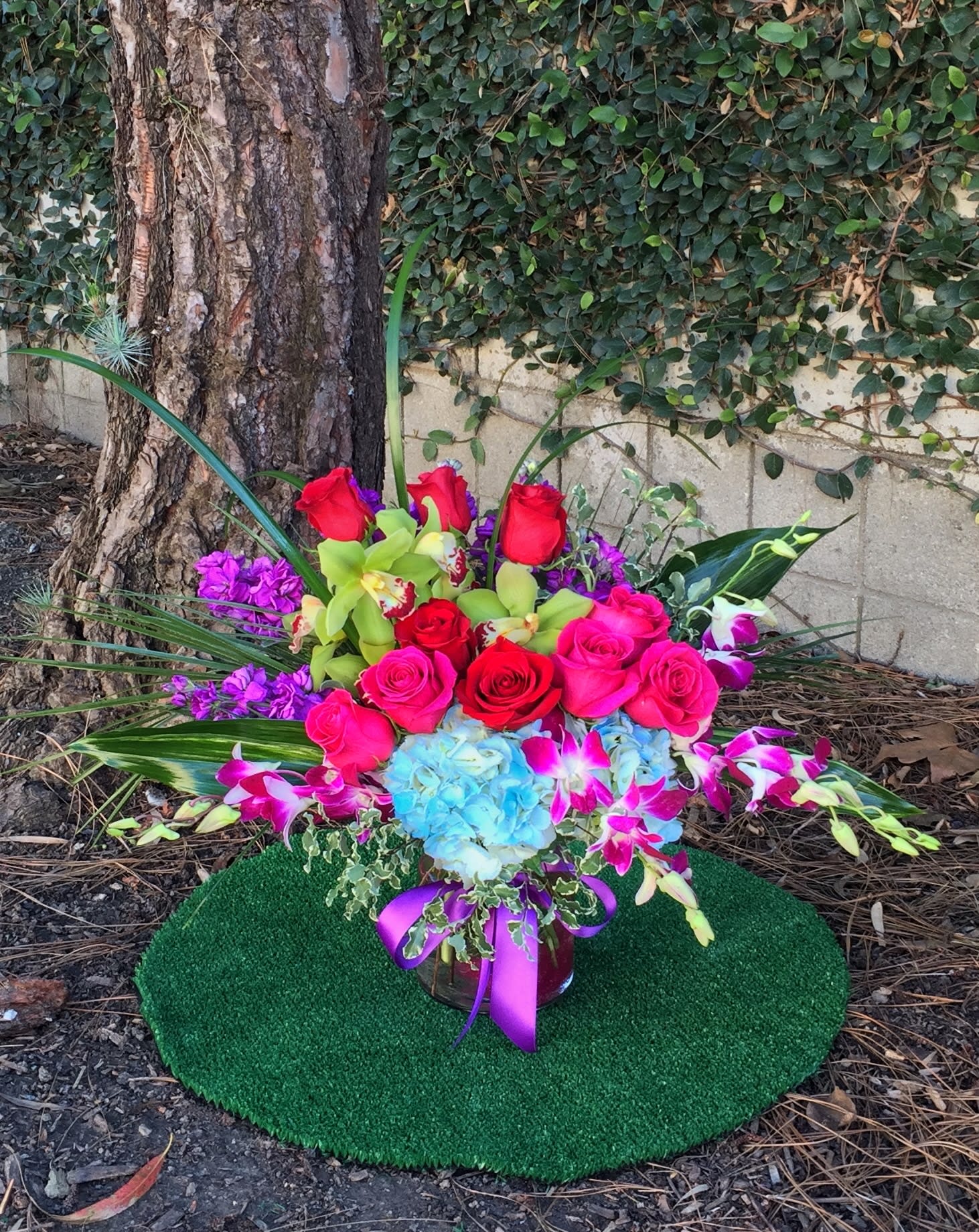 Joyous Life - Beautiful design including all premium fresh flowers: orchid, rose... and nice accents. STANDARD: FIRST PHOTO DELUXE: SECOND PHOTO PREMIUM: THIRD PHOTO