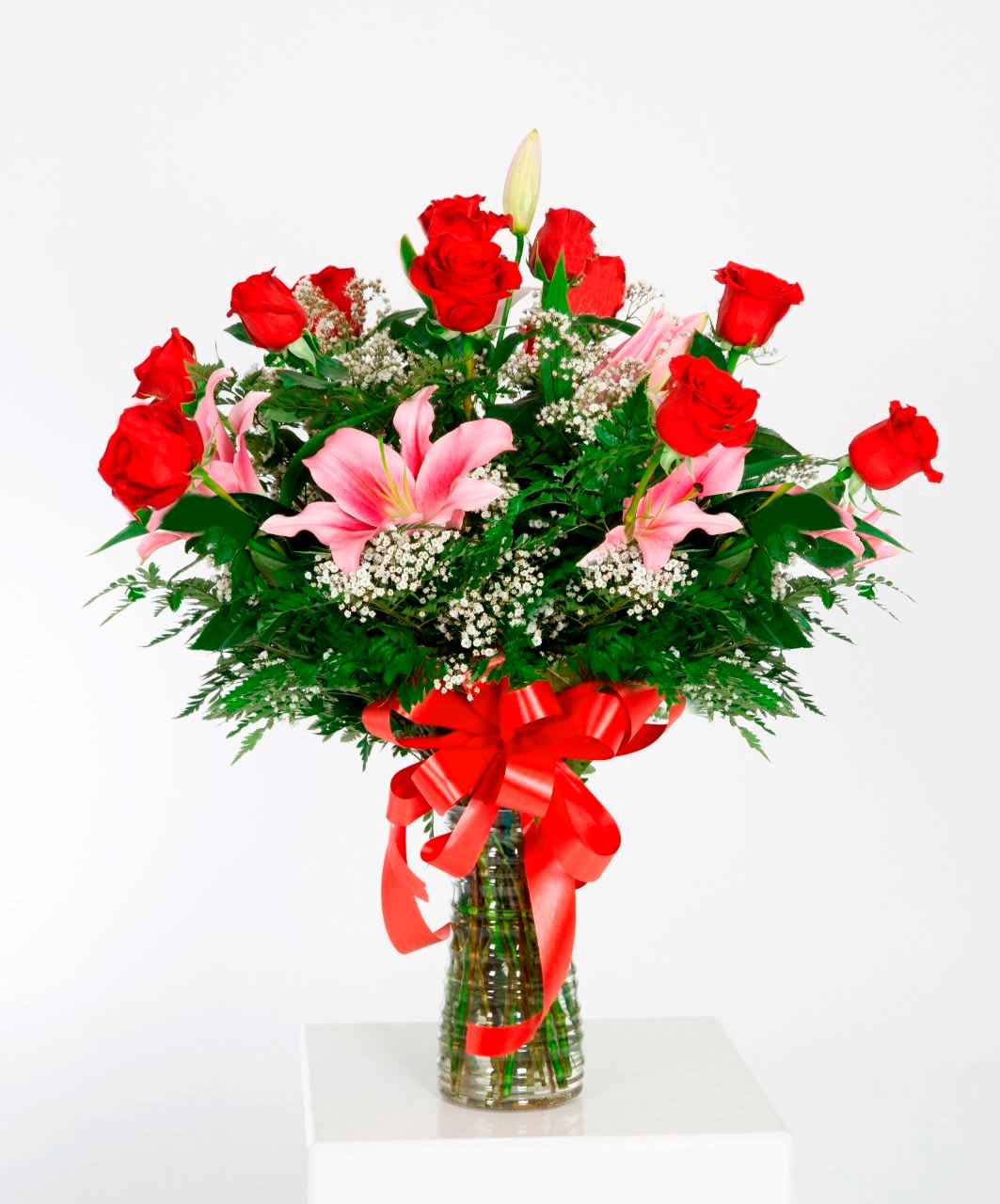 Gorgeous - A dozen long stem red roses and pink lilies.