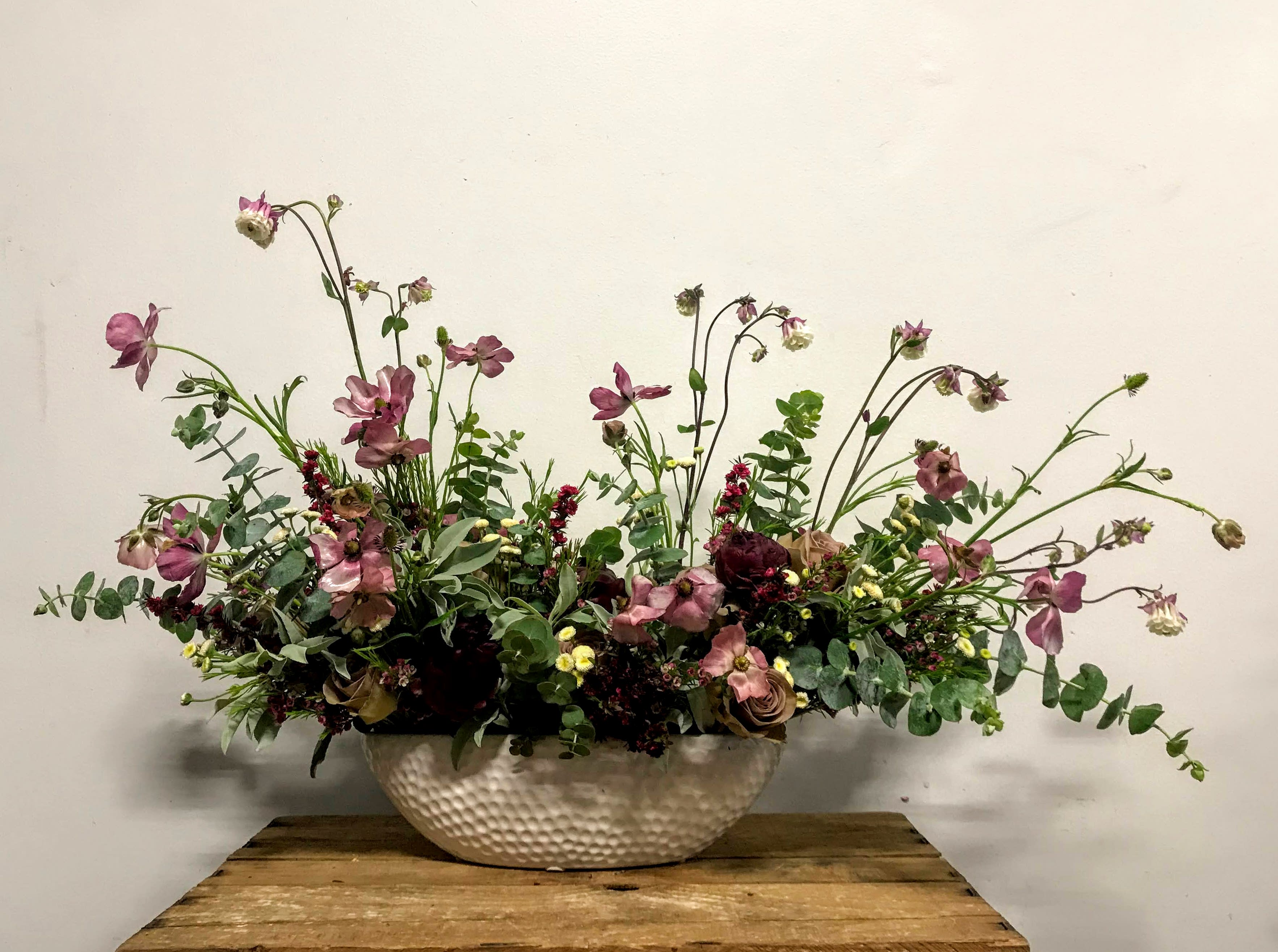 Natural Woman in Purple - For the nature lover.... this gorgeous boat combines seasonal best greens with purple flowers.