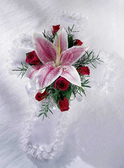 Spiritual Tribute Cross Pillow - A cross shaped pillow dressed with a stunning stargazer lily and red roses. For inside the casket.