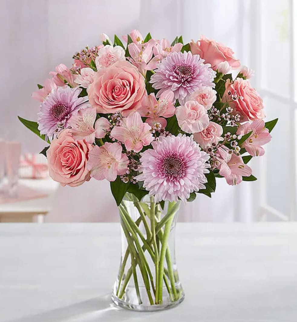 Budding Romance™ - Budding romance or longtime love, here’s gift that’s twice as nice. Our pink and lavender bouquet is hand-designed to help make Valentine’s special, whatever your status. 