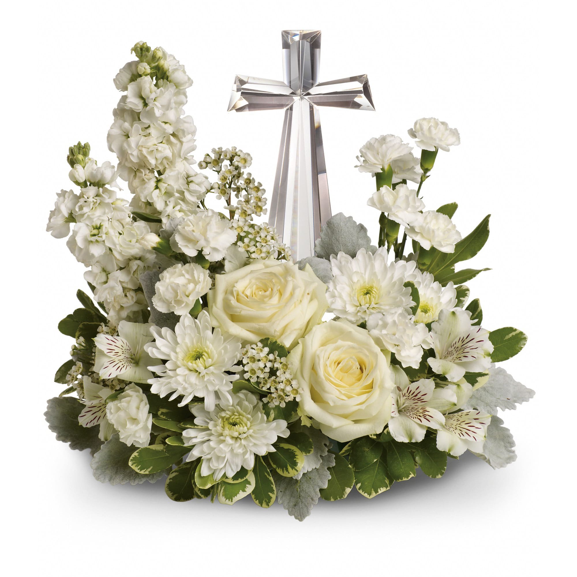 Crystal Cross of Peace Bouquet Crystal Cross of Peace Bouquet - An elegant display of faith and divine peace, this beautiful arrangement will comfort the bereaved in a truly thoughtful and respectful way. An exquisite crystal cross is surrounded by a bed of lovely blossoms. It is sure to be appreciated and always remembered. A fragrant mix of pure white blooms - including roses, alstroemeria, stock, carnations and waxflower - is accented with dusty miller and variegated pittosporum around an exclusive Crystal Cross keepsake. Approximately 14 1/2" W x 13 1/2" H Orientation: One-Sided As Shown : T229-2A Deluxe : T229-2B