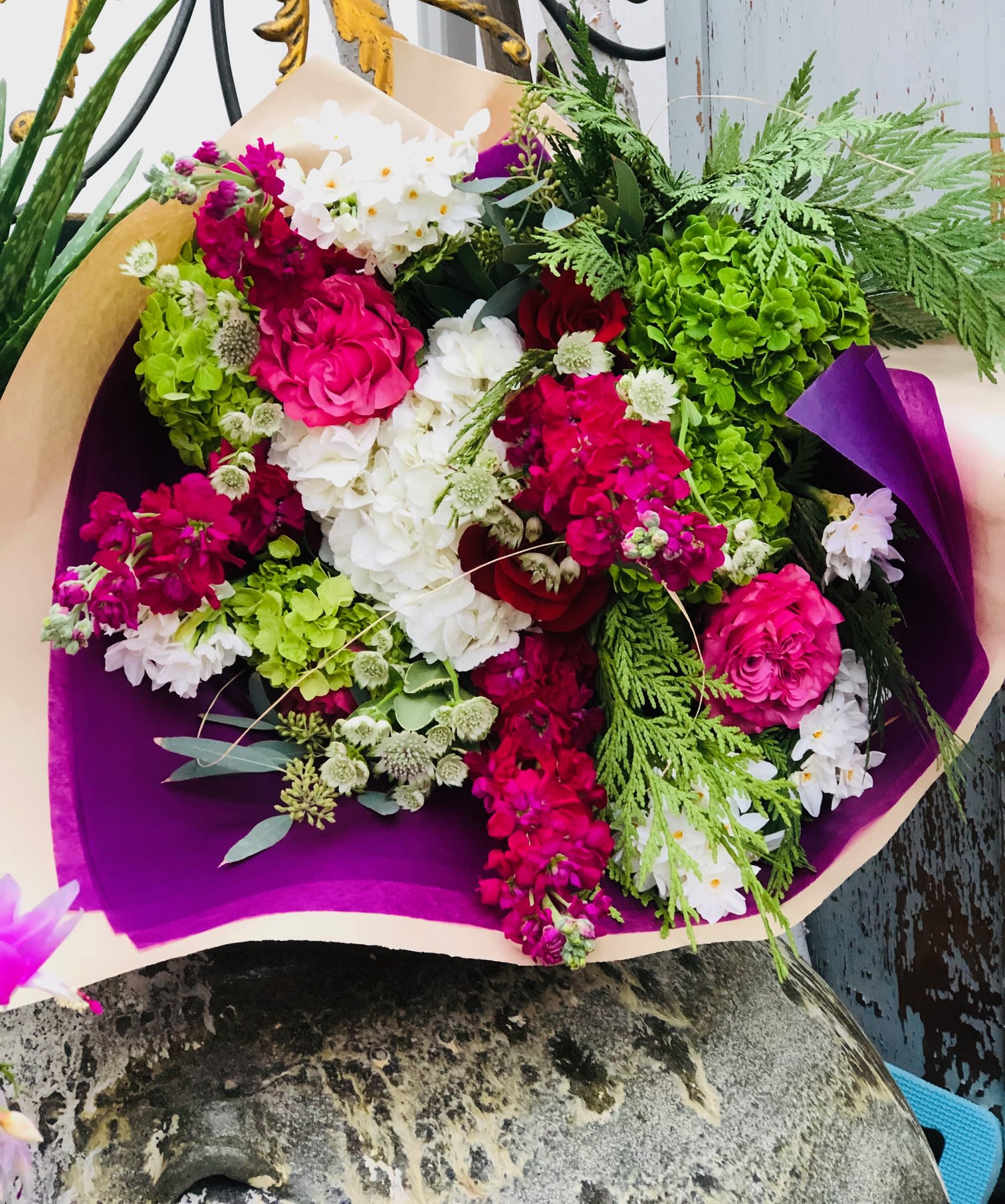 Wuthering Heights - A Beautiful French Hand tied Presentation style bouquet for the love of your life.  Flowers will always vary, but for this occasion we will offer Red Roses,  Cottage Roses, Stock, Hydrangea, topped with seasonal fillers and Wax Flower and true to ABloom, there will always be surprise blooms from far off lands. Hand wrapped in Brown paper with a coordinating tissue. 