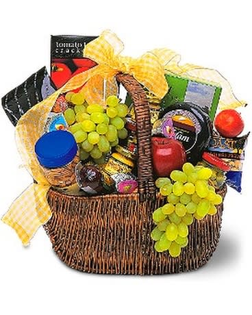 Gourmet Picnic Basket Gourmet Picnic Basket - Send this basket filled with delicious fruits and foods, and someone special will enjoy a memorable picnic day. Makes a great corporate gift, too. Fresh fruits, cheeses, nuts, sausage, olives and crackers arrive in a bow-tied wicker basket. Please note: All of our bouquets and gift baskets are hand-arranged and delivered locally by professional florists. This item may require additional lead time so SAME-DAY DELIVERY NOT AVAILABLE. As Shown : TF157-1