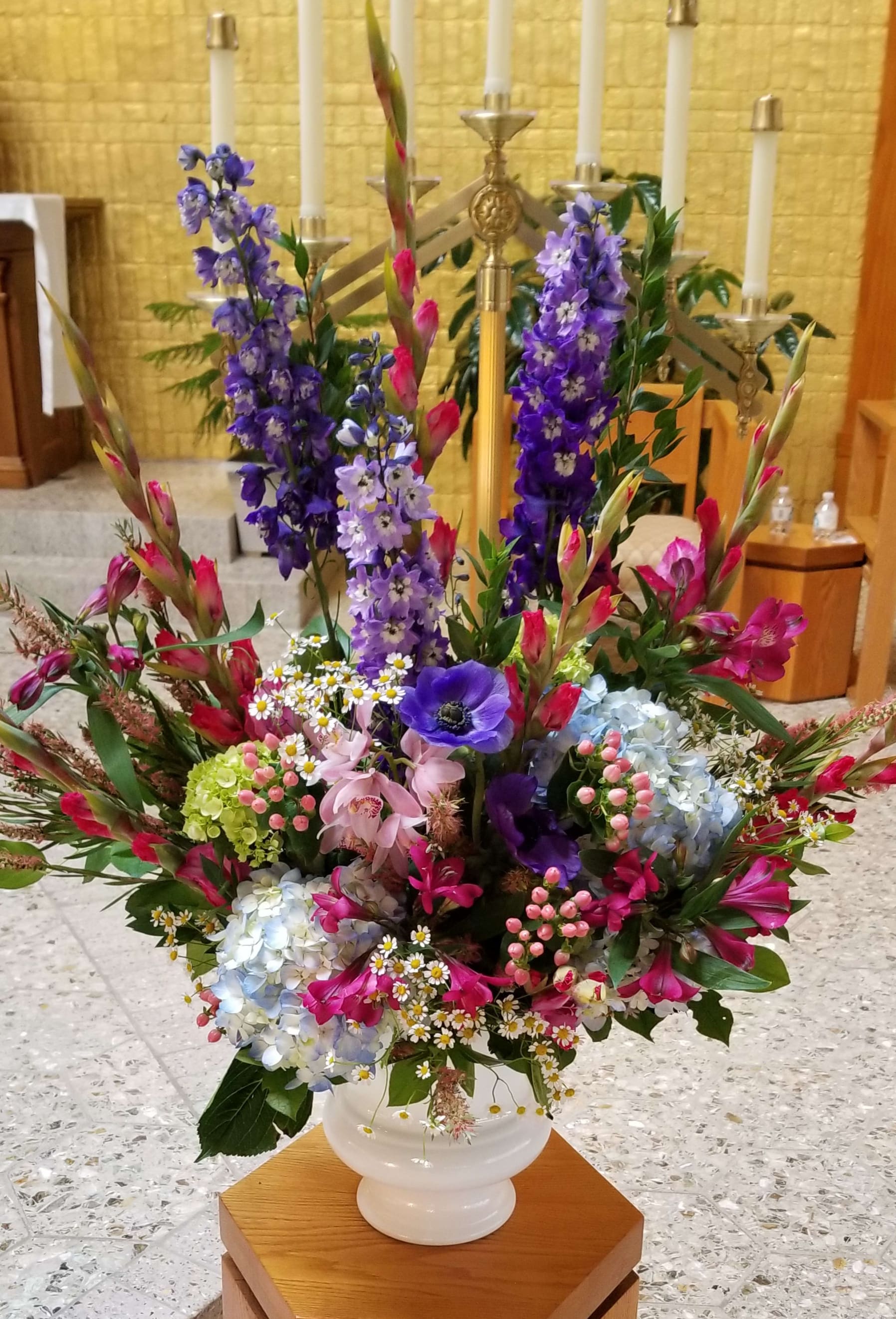 Garden styled altar arrangment  - Mixture of garden flowers and colors for an altar arrangement, delphiniums, hydrangea, gladiolas, alstomerias, anenomes. Flower types subject to seasonal availability. **It is always best to schedule a consultation for a full wedding quote** NOT AVAILABLE FOR SAME DAY DELIVERY- THIS IS A PREBOOKED ITEM ONLY **