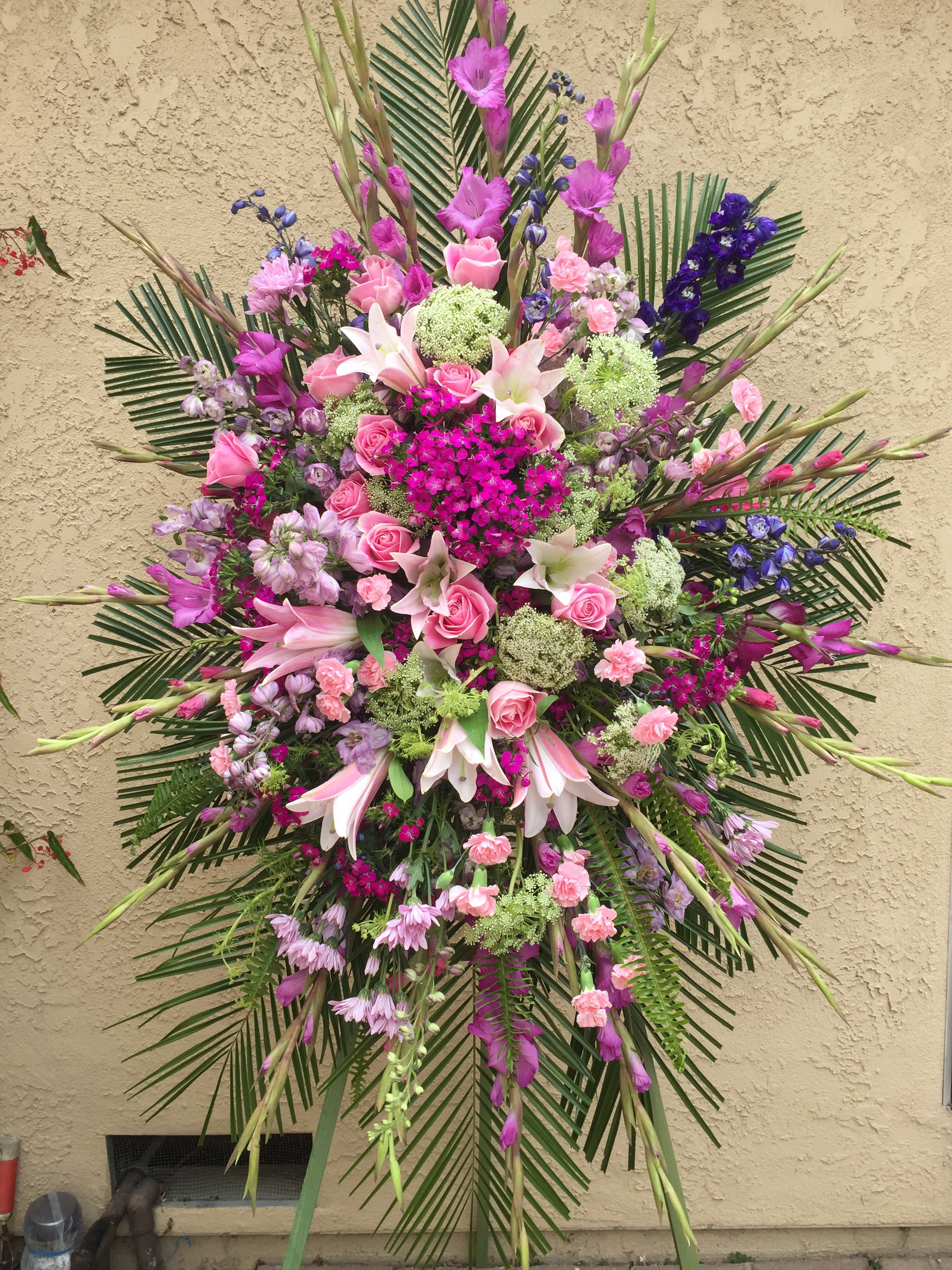 Funeral Spray 10 - Standing spray of pink flowers