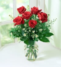 Half Dozen Roses - Six beautiful red roses arranged with greenery in a glass vase. Other colors may be available, please make 1st and 2nd choices.