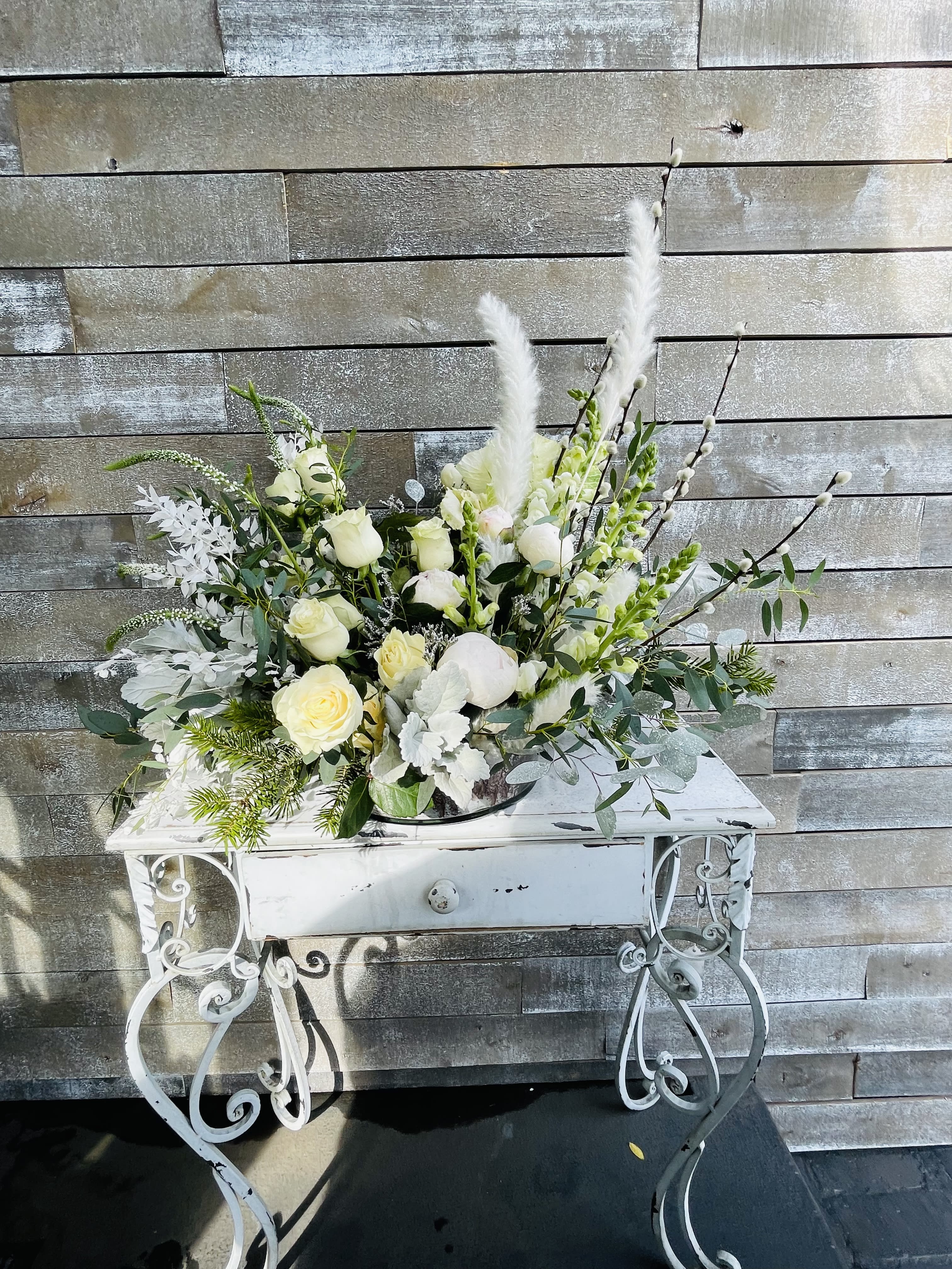 The Wilshire Meadow - Soft eclectic palette of whites and creams accented with preserved bleached flowers in a low cylinder wrapped in birch paper. Truly bring a meadow to Wilshire with this stunning bouquet today
