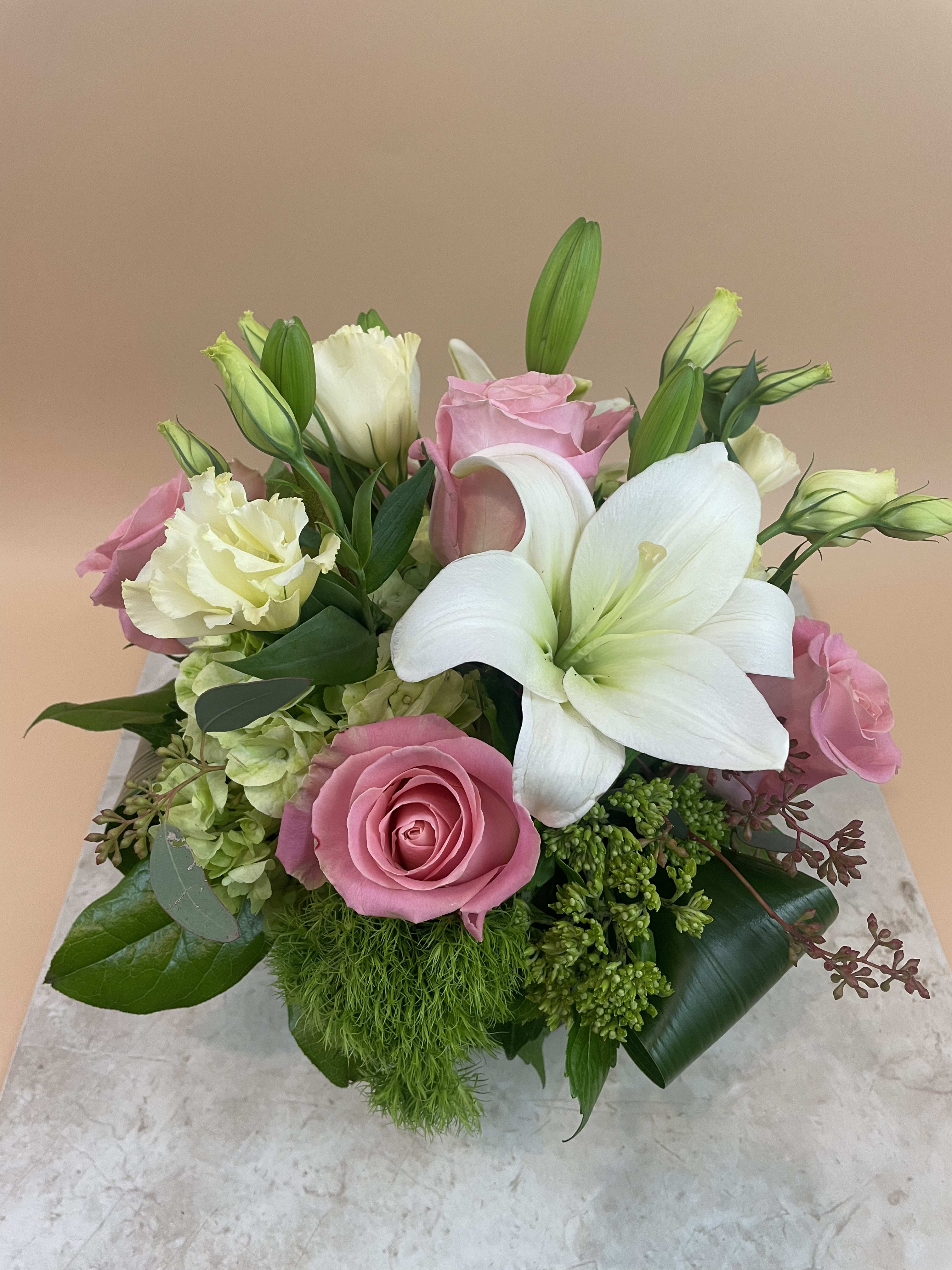 Sweet Success - A coveted collection of lush pink and white blossoms.
