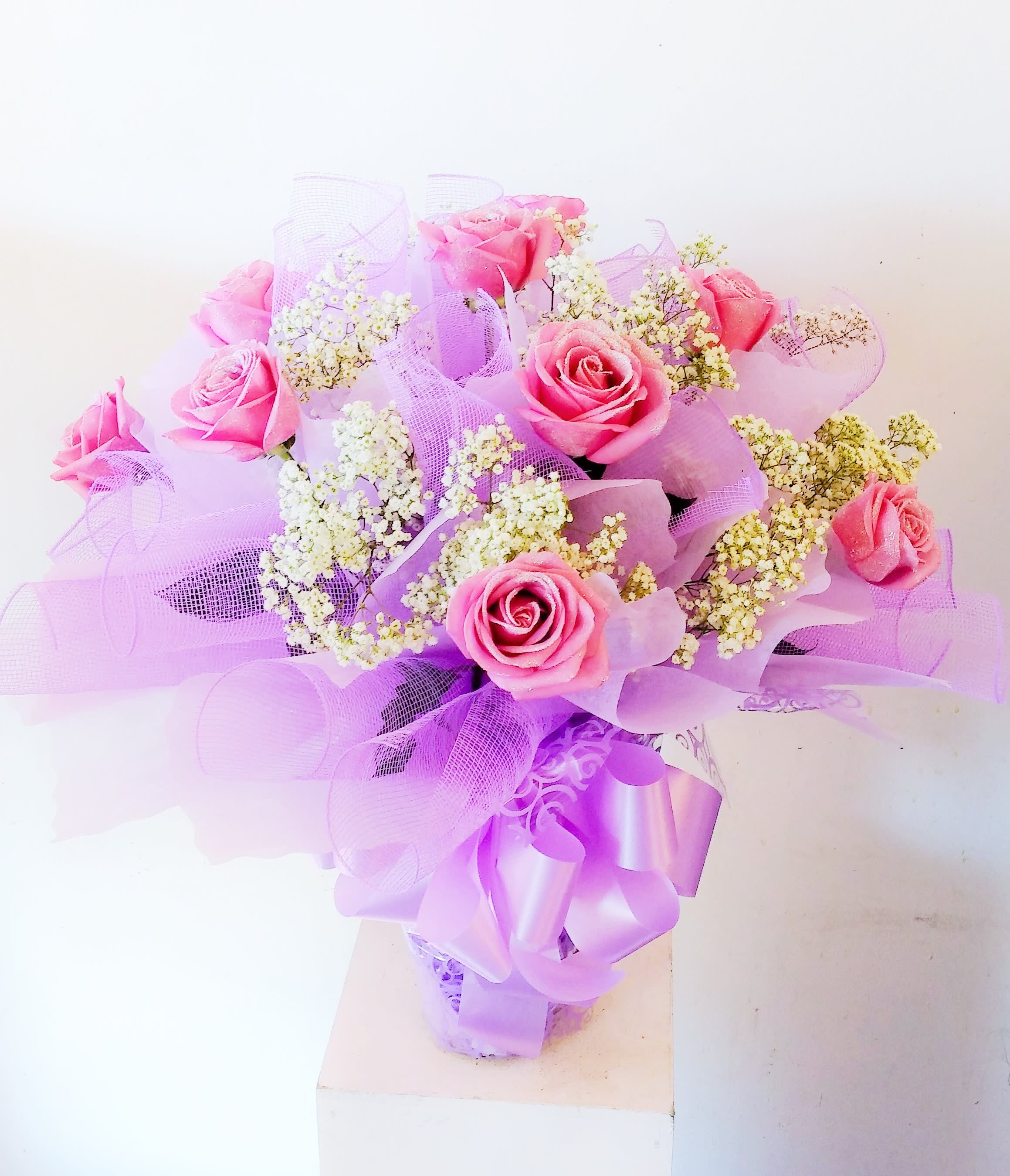 Hong Kong Style- 1 dozen lavender roses - 1 dozen glittered lavender roses wrapped Hong Kong style and arranged in a vase.