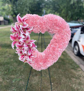 All carnations with lilies standing open heart - A 21in open standing heart with carnations and lilies (colors of choice)