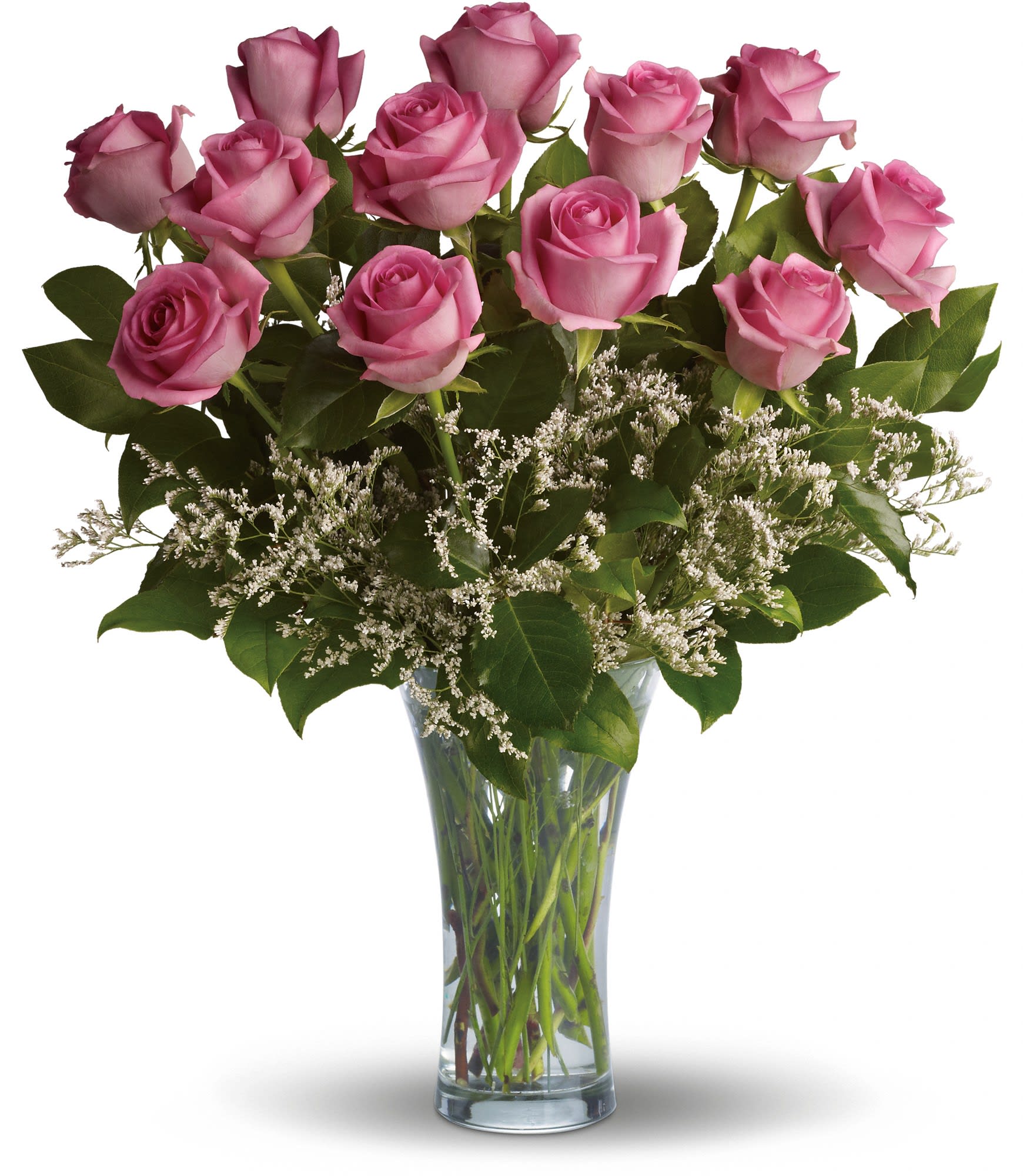Make Me Blush - Dozen Long Stemmed Pink Roses Make Me Blush - Dozen Long Stemmed Pink Roses - It's fun to be flirty! Send a dozen roses to the one you love and she just might make you blush. Especially if the dozen roses in question are this gorgeous! This arrangement is sweet and innocent as can be. Of course, it's a bit sassy and a whole lot sexy, as well. Sending a dozen perfectly pink roses and white limonium arranged in a glass vase to the woman you love shows that you know how much fun love is! And every woman appreciates that! Approximately 17 1/2" W x 20 1/2" H Orientation: All-Around As Shown : T4-1A Deluxe : T4-1B Premium : T4-1C