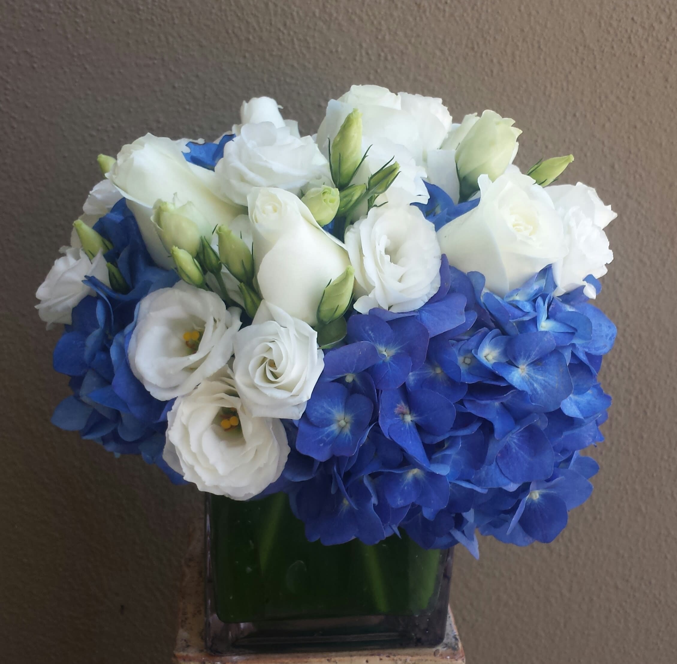 Blue and White Square - Nice elegant low square arrangement in blue and white premium blooms.