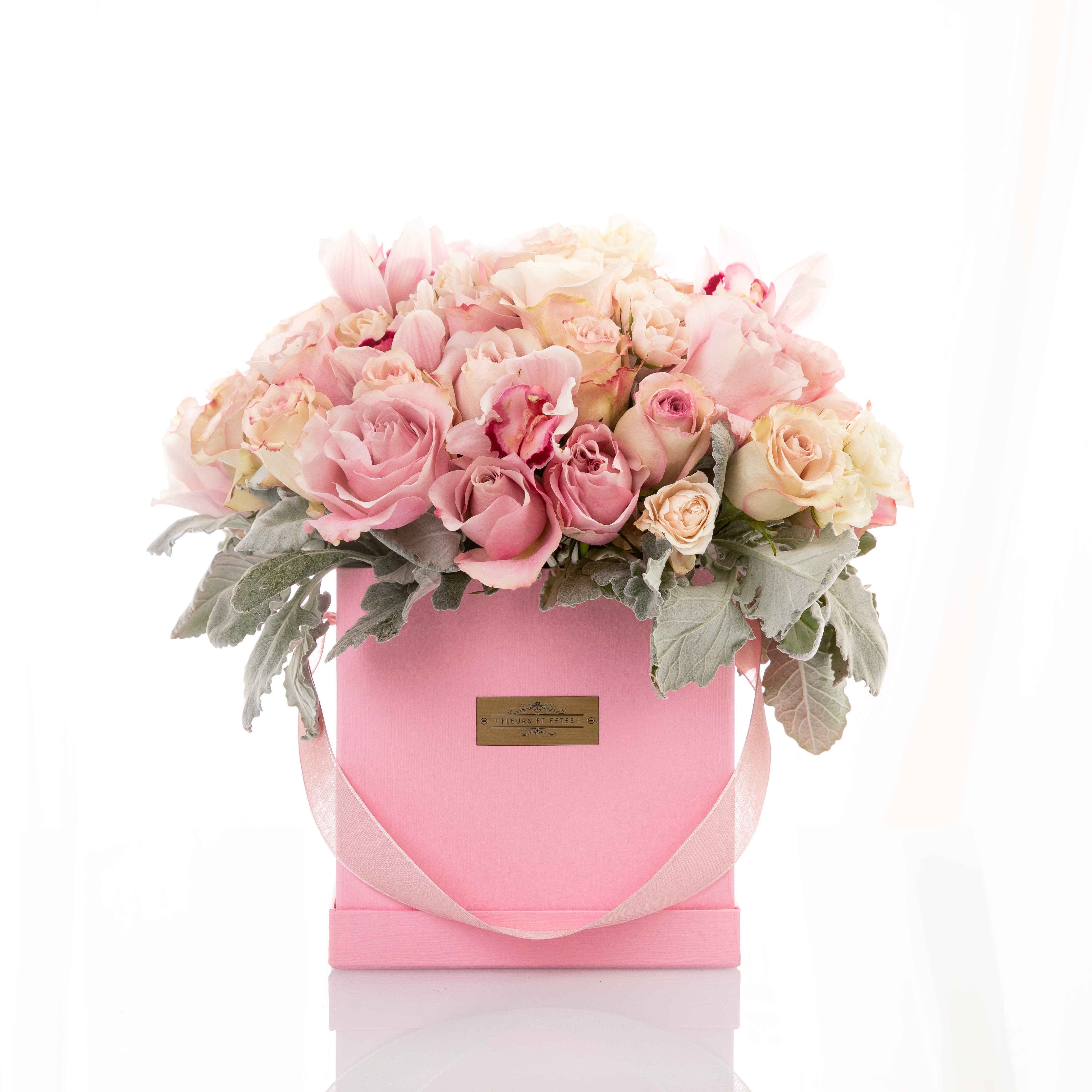 Blossom - Featuring fresh flowers. Shades of pink in this arrangement embody a gentler kind of loving emotion. Designed in our large signature box.