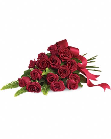 Rose Impression - An elegant all-red rose bouquet hand-tied with satin ribbon. Heartfelt in its simplicity it is perfectly paired with soft-green sword fern.
