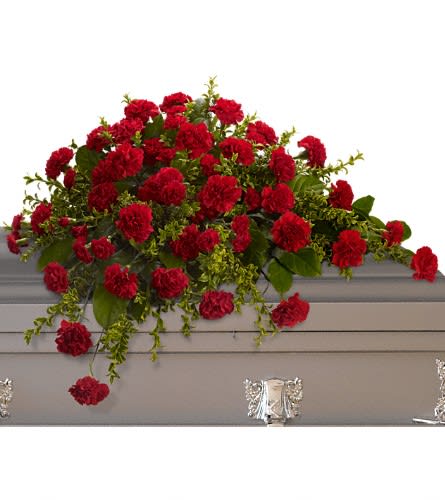 Adoration Casket Spray - This classic half-couch spray of brilliant red carnations makes a striking and dignified statement. Radiant red carnations and miniature carnations accented by fresh greenery arrive in a lovely spray.Approximately 36&quot; W x 27&quot; H Orientation: N/A As Shown : T242-2A