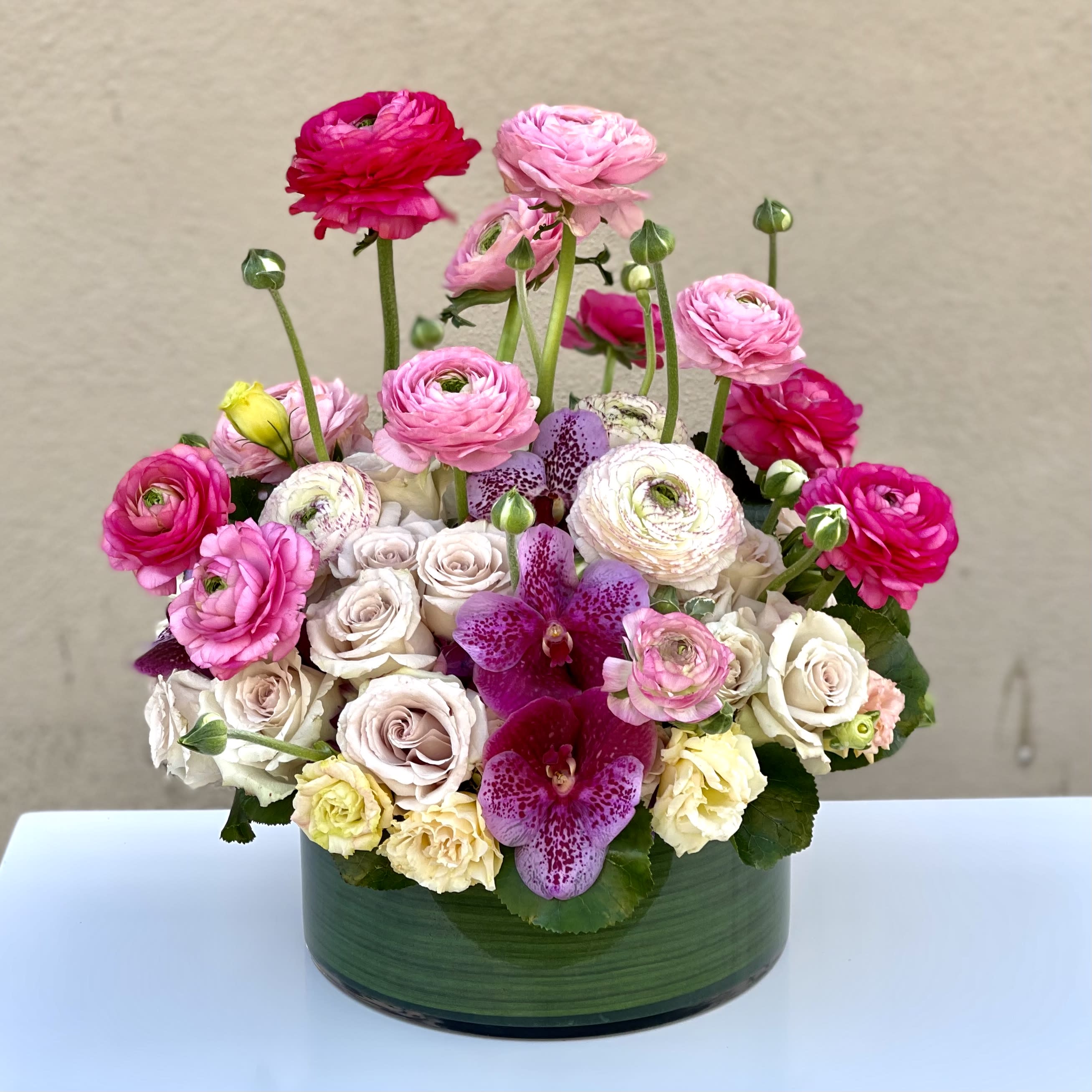 Make a wish - Fresh from the garden.... a lovely mix of over 75 stunning multi-colored blooms including Hydrangeas, Roses, and a variety of other seasonal flowers. Luscious colors, beautiful buds and textures combine into a dazzling bouquet of blossoms~ sure to warm the heart. 