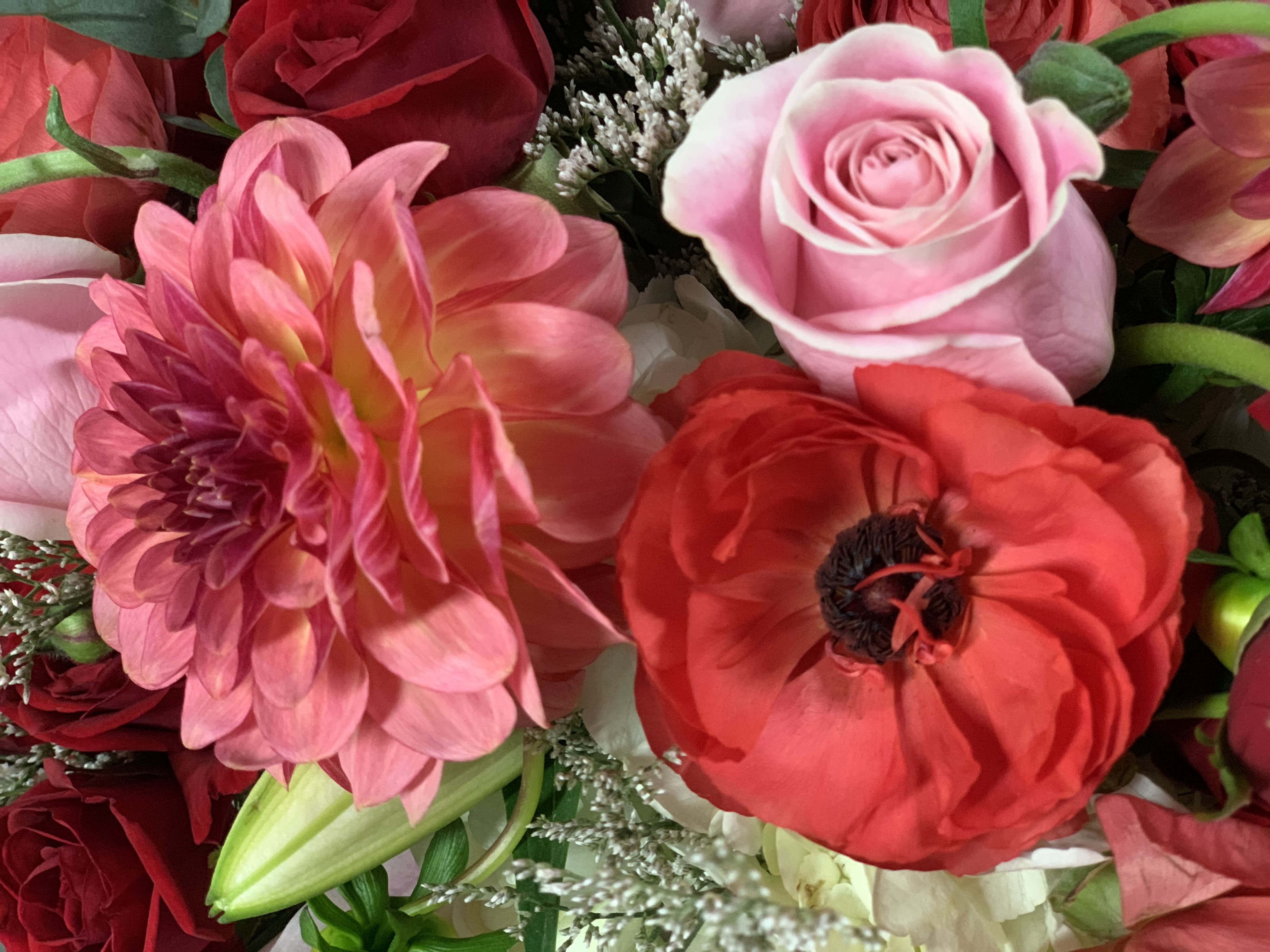 Designer’s choice tall arrangement  - Tall Valentine’s Day mix, no carnations or daisies in a vase. 