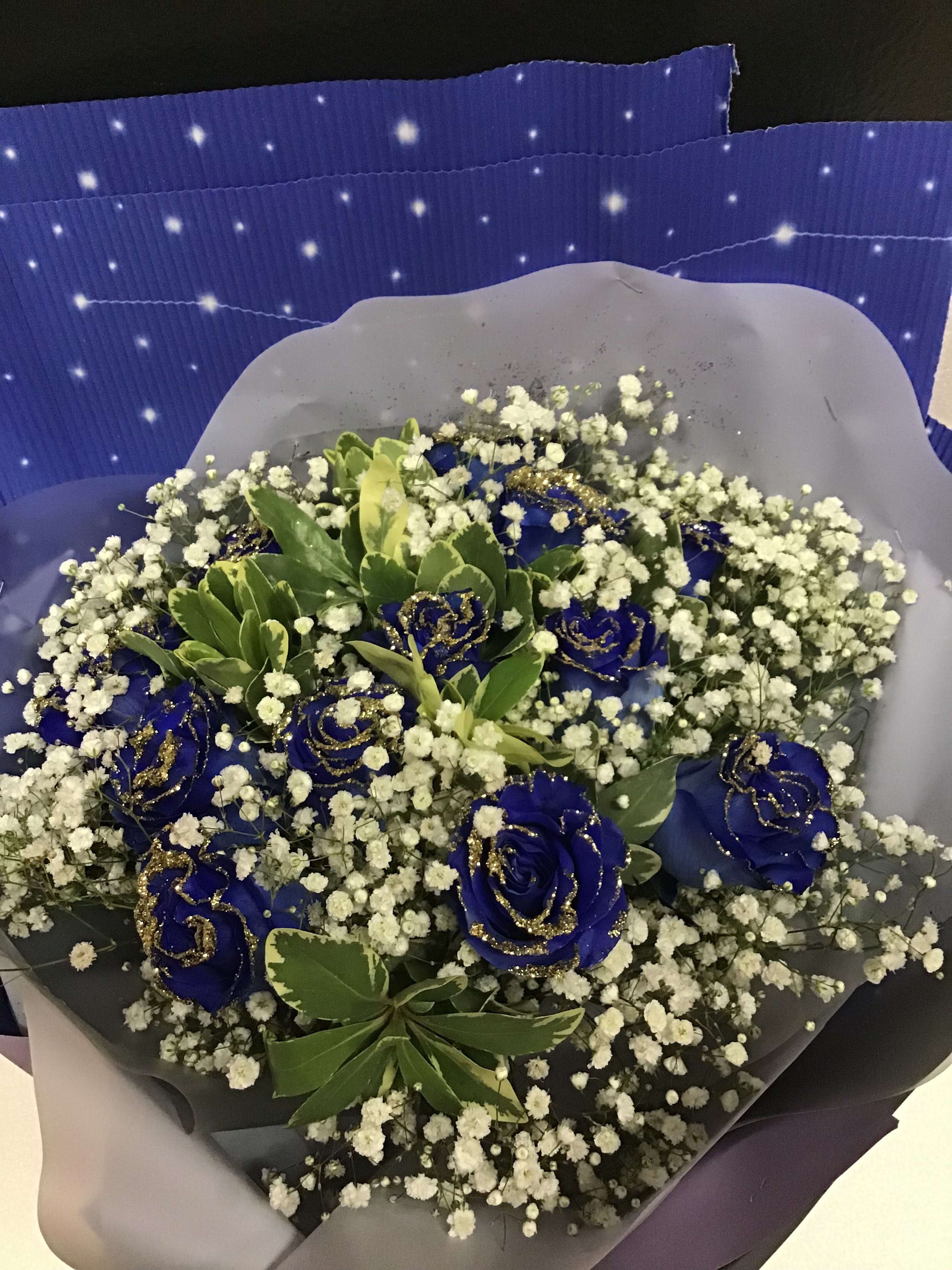 Dozen blue roses by From the Heart Florist