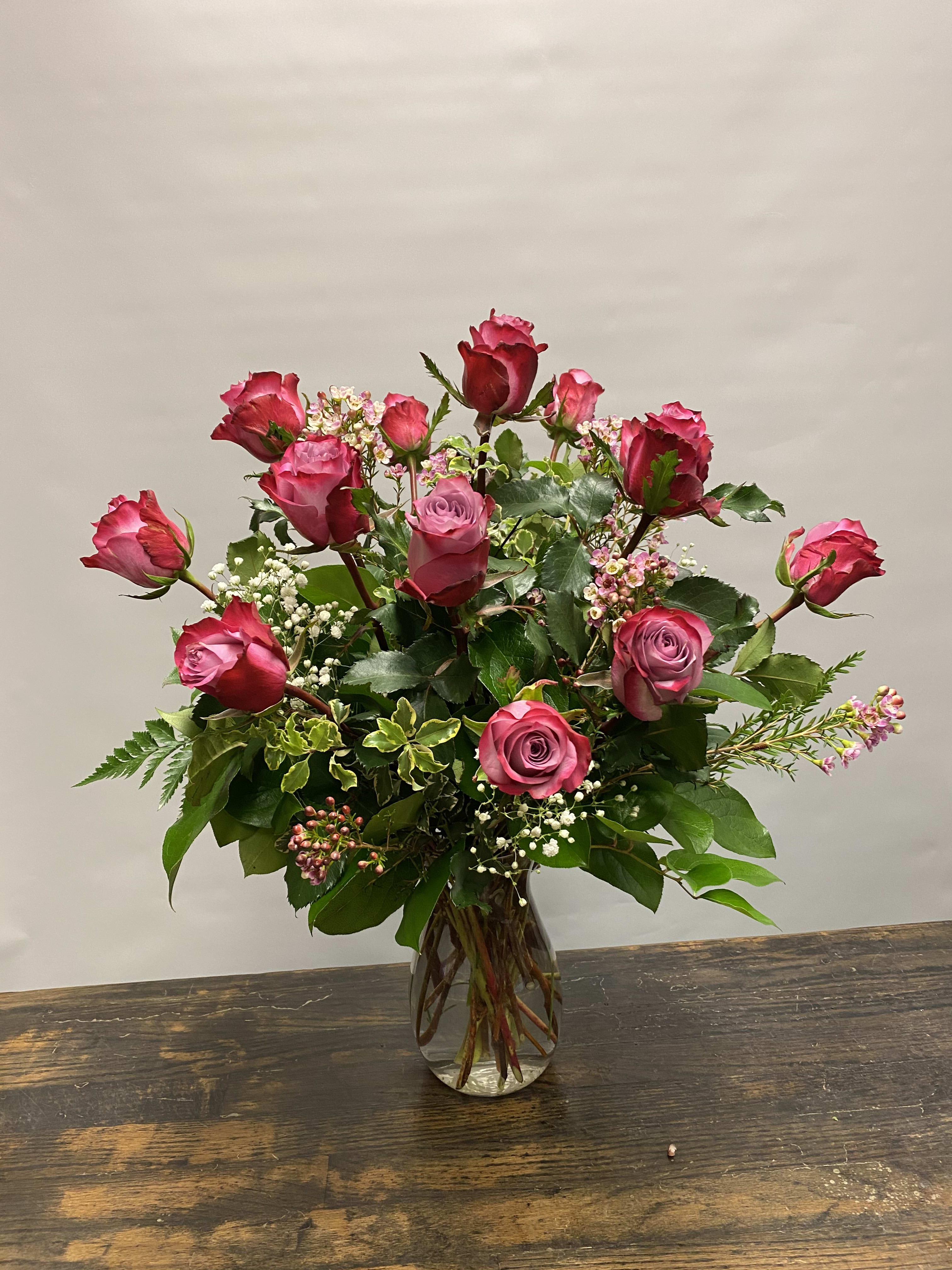  Colored Rose Arrangement - this arrangement can be in any color roses that are available. 
