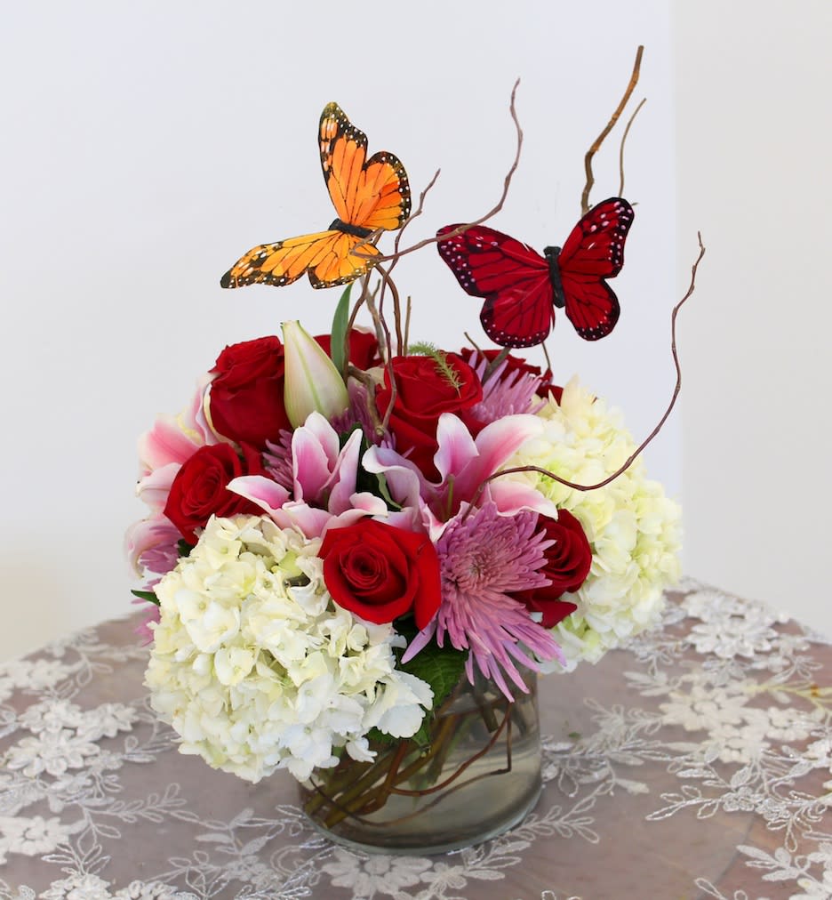 Butterfly  - Hydrangeas, Roses and Lilies with loving butterflies. 