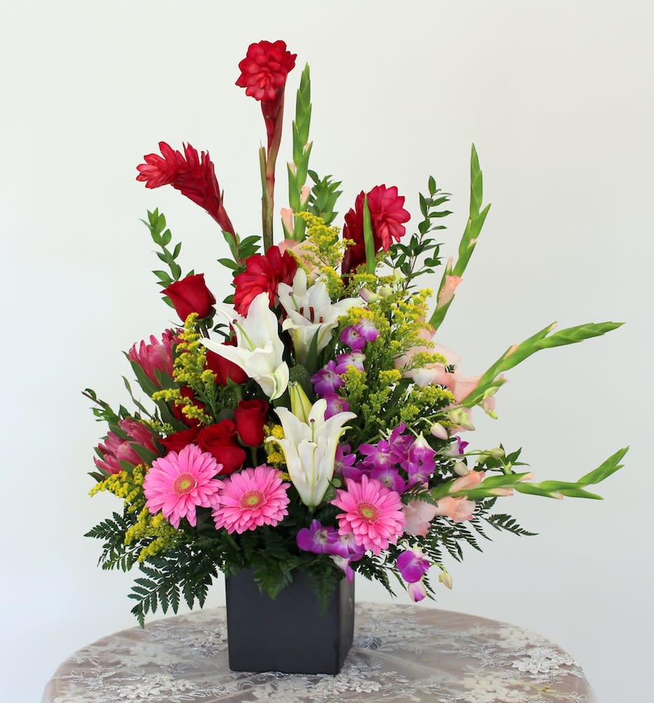 Daisies and Ginger - Gerber Daisies, Ginger, Orchids and Gladiola.