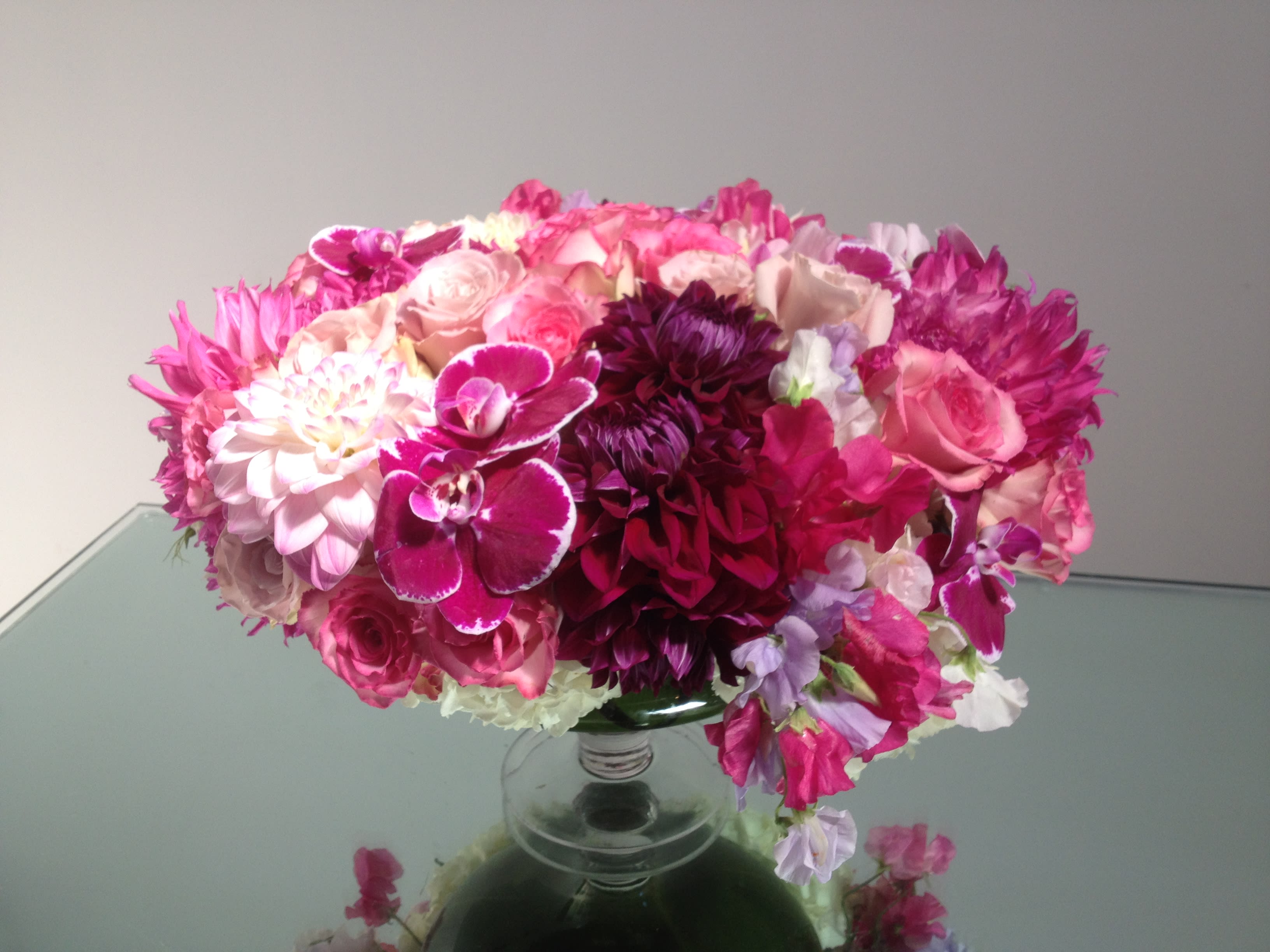 Blushing Bouquet - Ultra-feminine composition in a low glass urn.