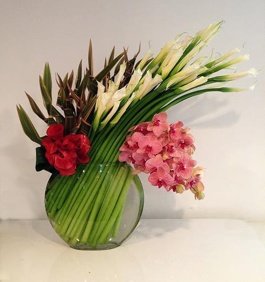 Edge of Beauty Edge of Beauty - White modern Calla Lilies, Phael orchids in yellow and pink,