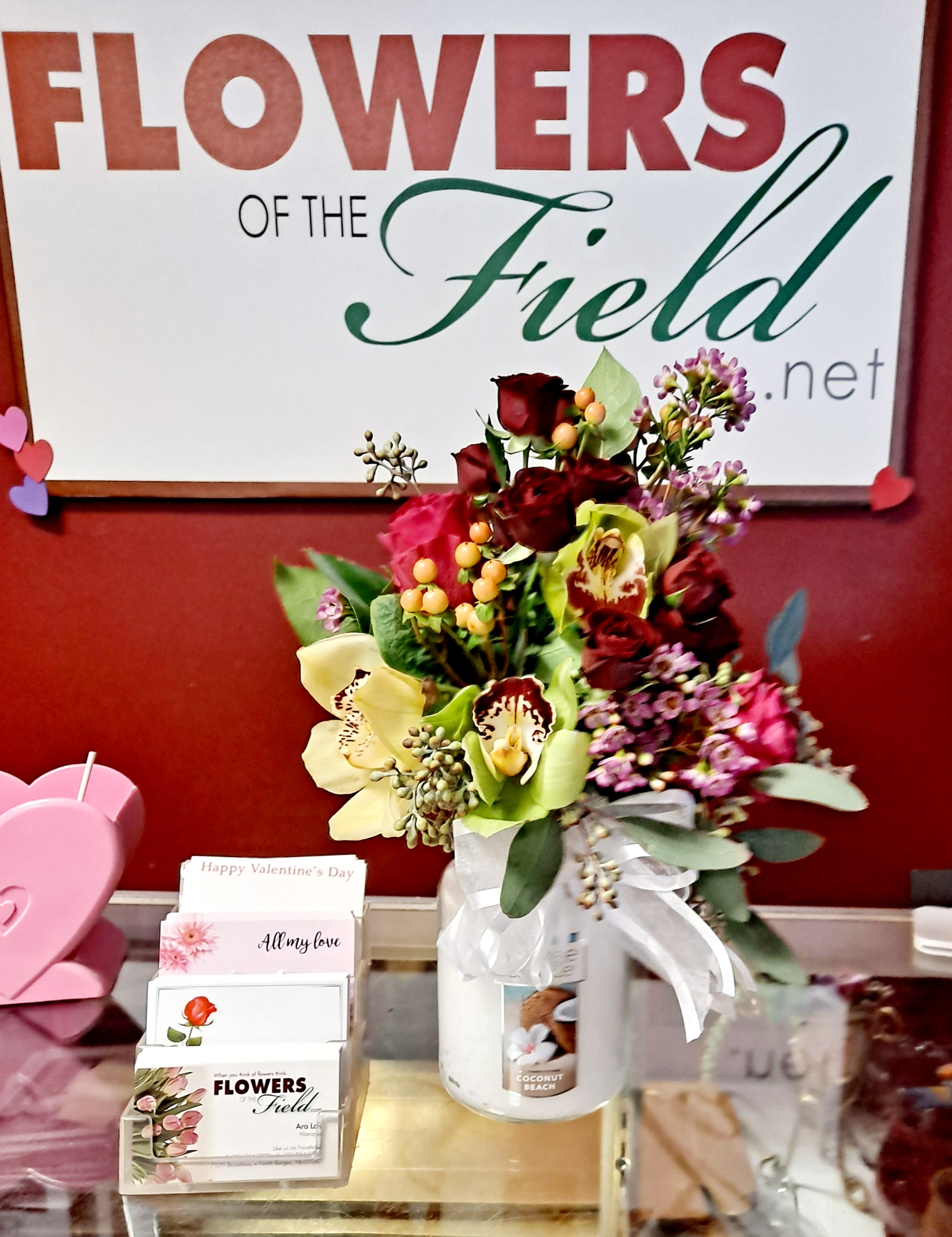 Yankee Candle Arrangement - Fine Flowers Beautifully Arranged On Top Of A Yankee Candle. Flowers &amp; Candle May Vary