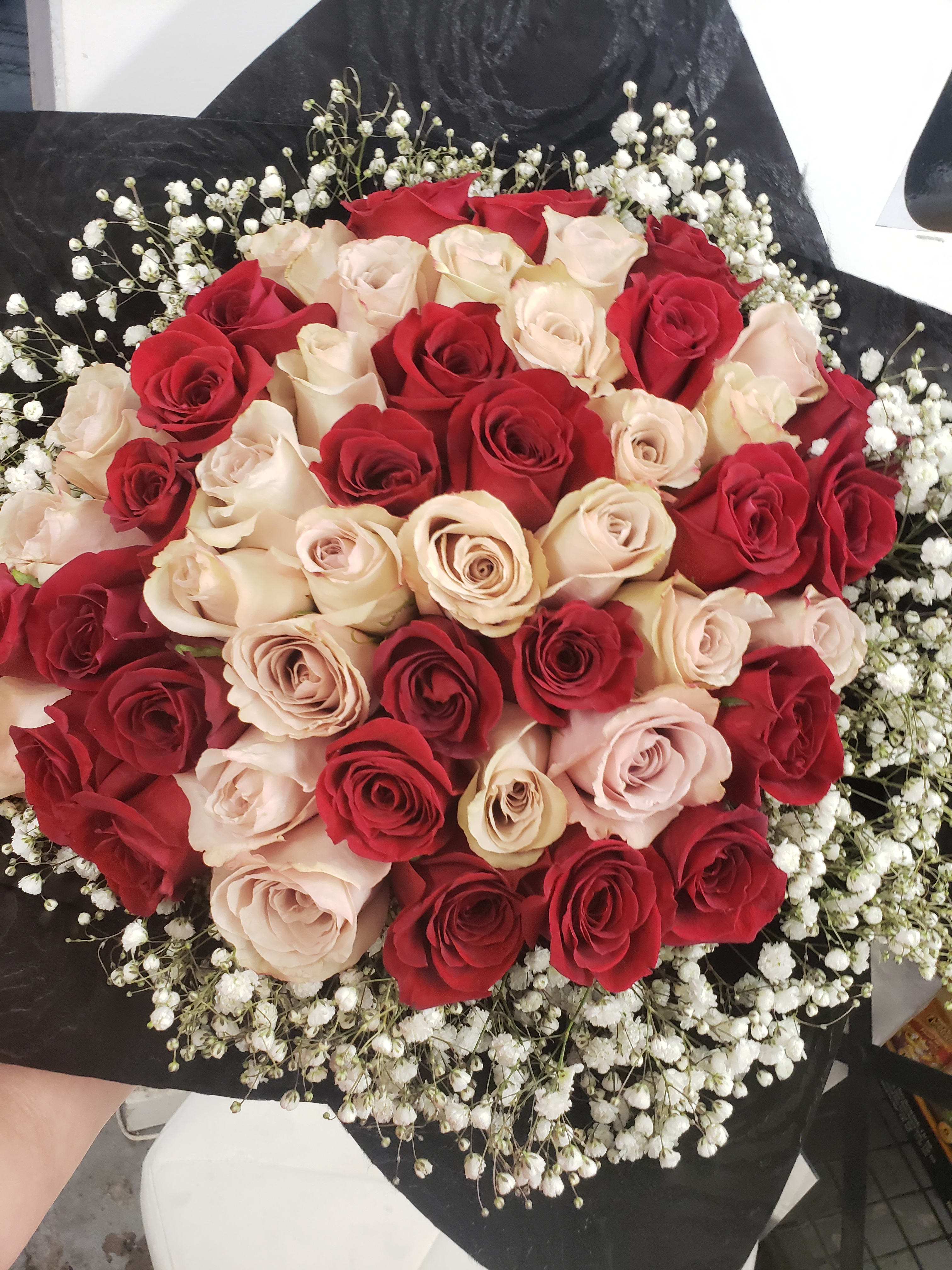NOLITA  - Hand tied bouquet with rose  Red and quicksand, baby breath touch!
