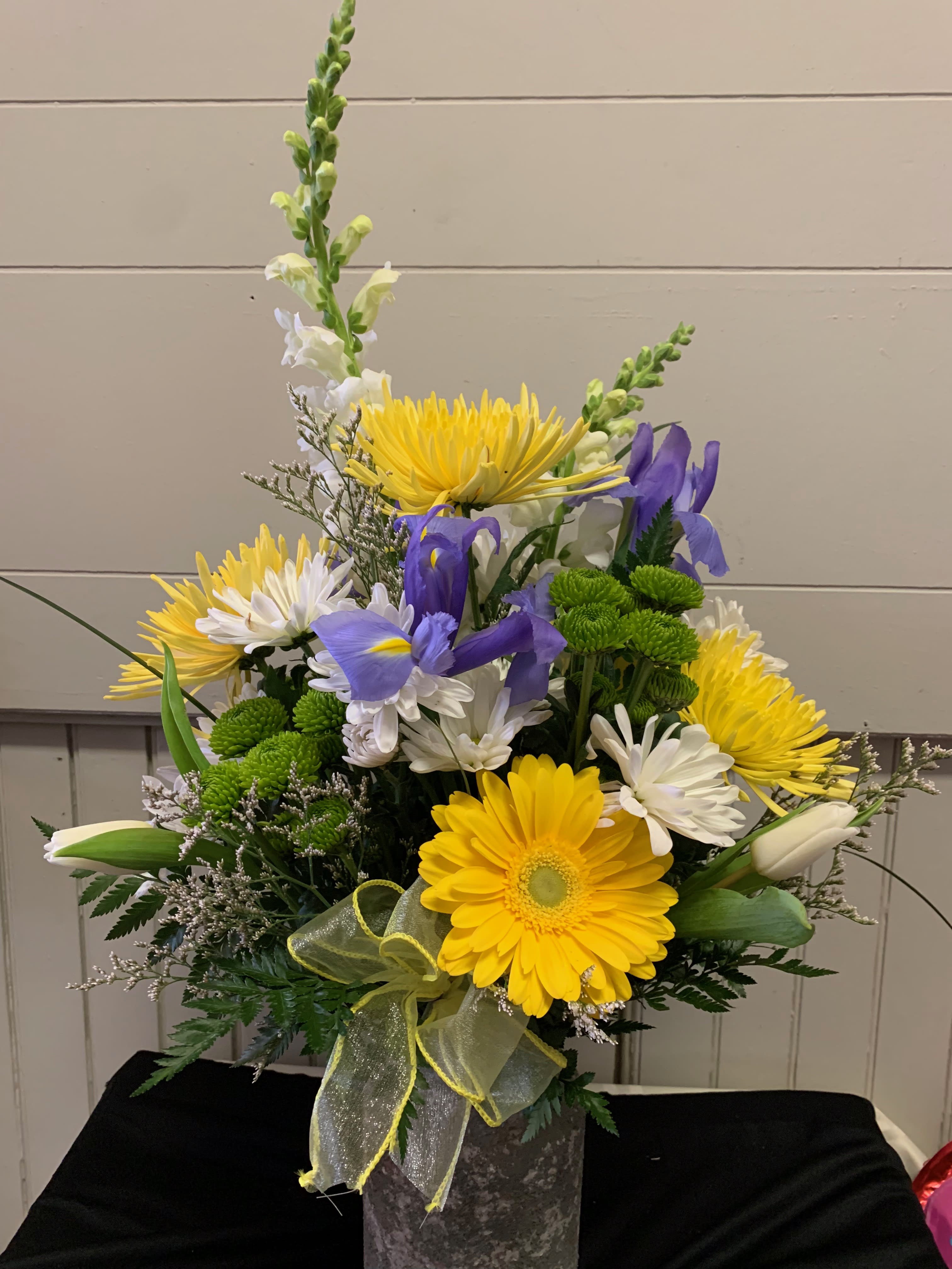 Spring Iris Bouquet Spring Iris Bouquet - An iris bouquet paired with green and yellow flowers arranged in a vase