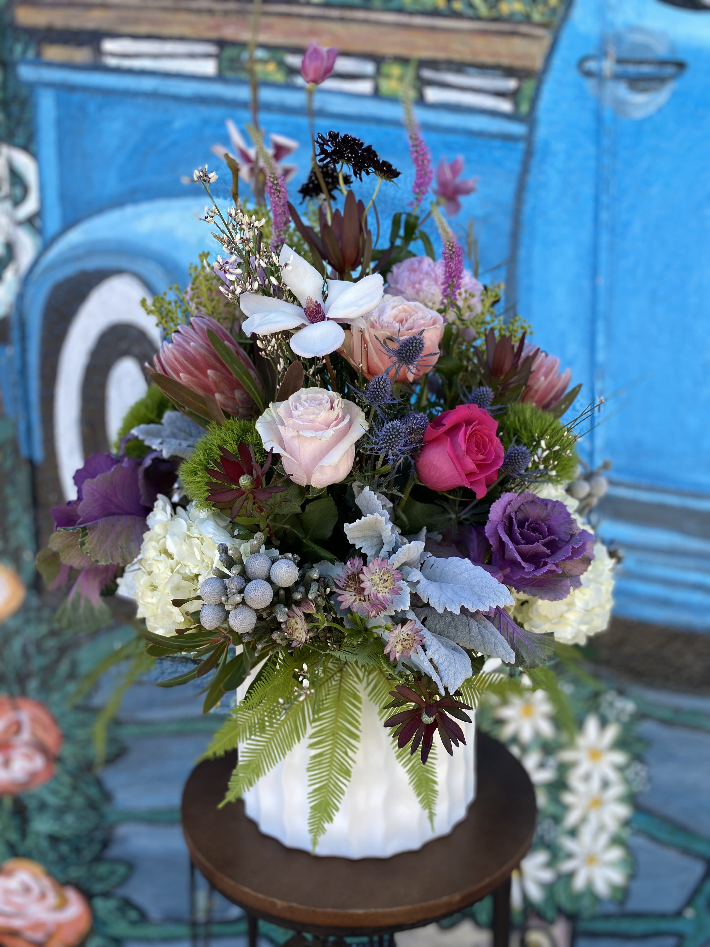 Garden Love - Mixed flowers arranged in a vase. 