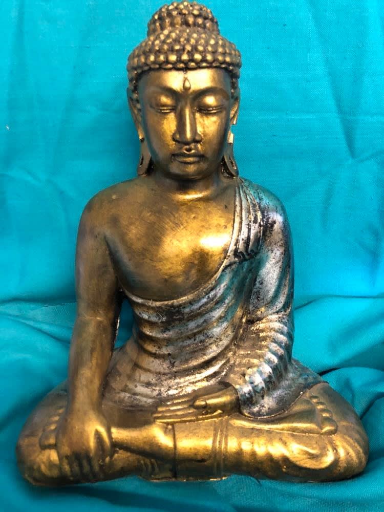 Meditating Buddha Meditating Buddha - 12in by 10in. Imported from Indonesia. Add peace and serenity to any space.