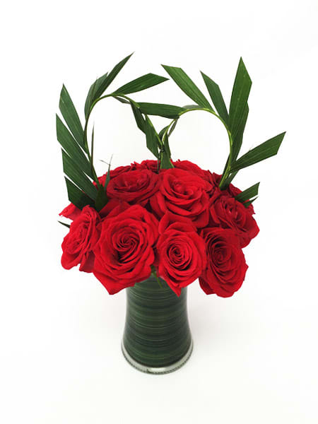 Expression of Love - A Dozen red roses with a palm shaped heart
