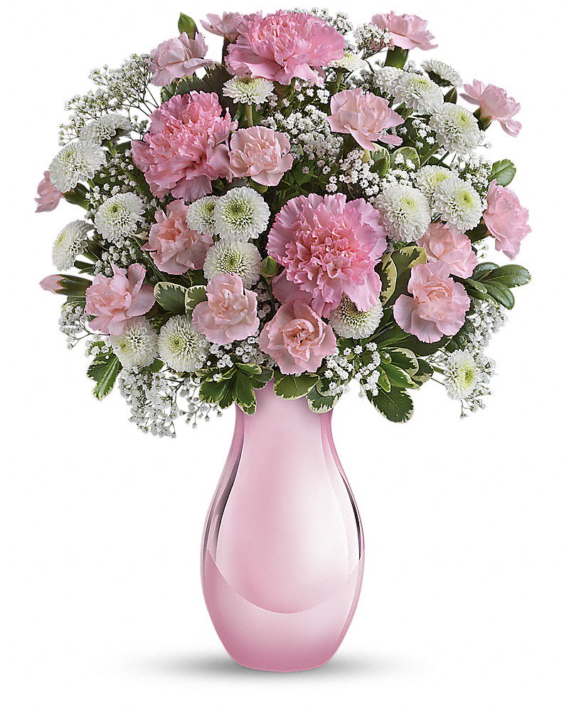 Teleflora's Radiant Reflections Bouquet Teleflora's Radiant Reflections Bouquet - Hurray for pink! Celebrate your sweet one with this sentimental bouquet - a delightfully pink mix of pink and white blooms presented in a keepsake Pink Reflections vase she'll cherish always. Pink carnations, white button chrysanthemums and million star gypsophila are accented with fresh greens. Delivered in a Pink Reflections vase.