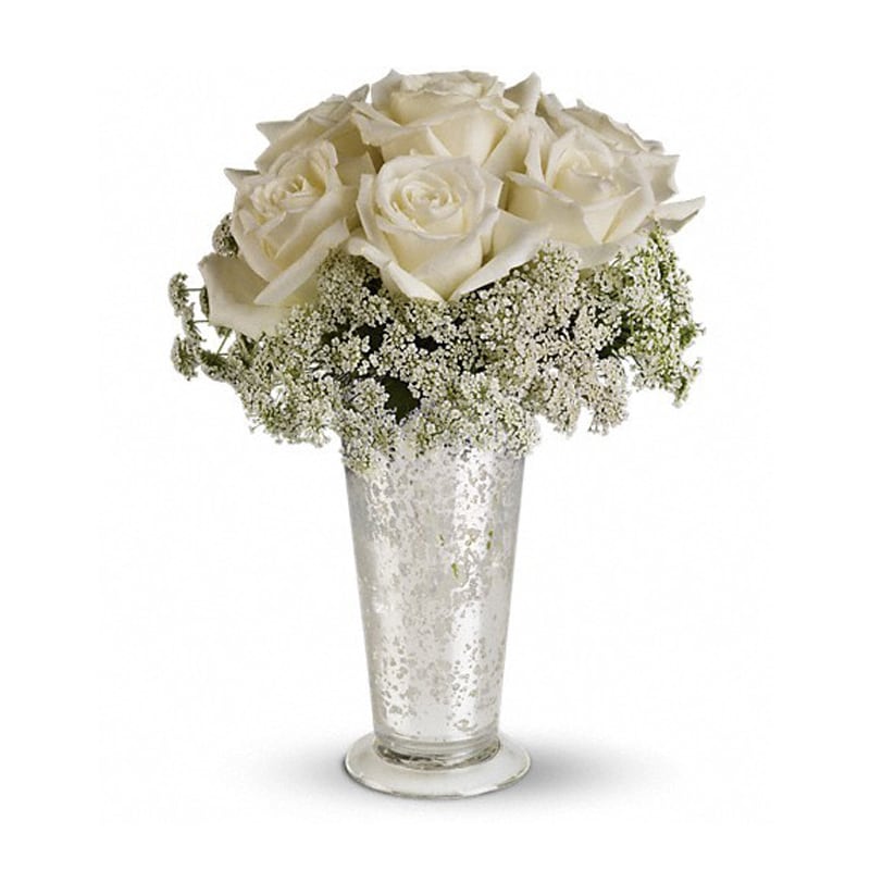 White Lace Centerpiece [T189-1A] - Queen Anne's lace forms a delicate collar around radiant white roses inside an antiqued Mercury Glass Vase. Looks lovely next to the wedding guest book, on smaller cocktail tables, or on your beloved wife's boudoir.  White roses and Queen Anne's lace are the simple but gorgeous ingredients in this centerpiece, presented in an Mercury Glass Antique Vase.  Approximately 9&quot; W x 12&quot; H  Orientation: All-Around      As Shown : T189-1A  