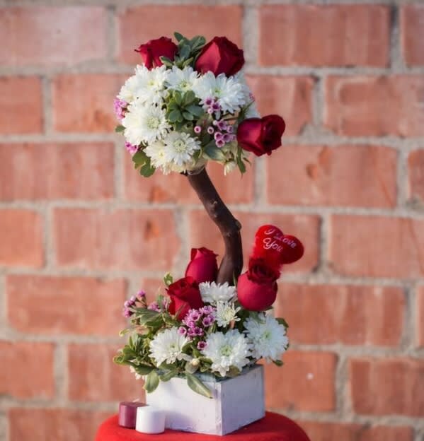 Garden Morning - Topiary arrangement with red roses and white chrysanthemums. 