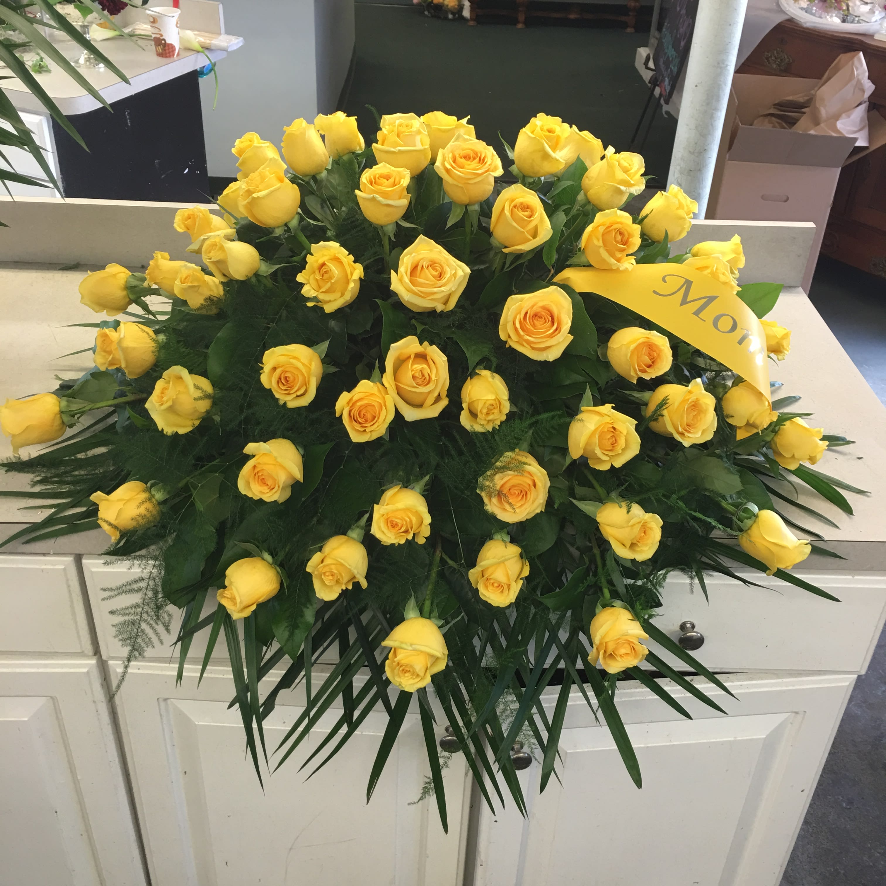 Evans Yellow Rose Casket Funeral Blanket in Peabody, MA Evans Flowers
