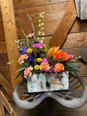 A Drawer Full of Love  - This wonderous drawer is filled with enchanting blooms. This stunning arrangement includes, Roses, Lilies, Carnations , and other in season flowers. 