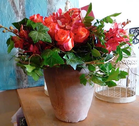 Rose Garden Rose Garden - Garden style arrangement of roses and orchids. (as shown: Deluxe arrangement)